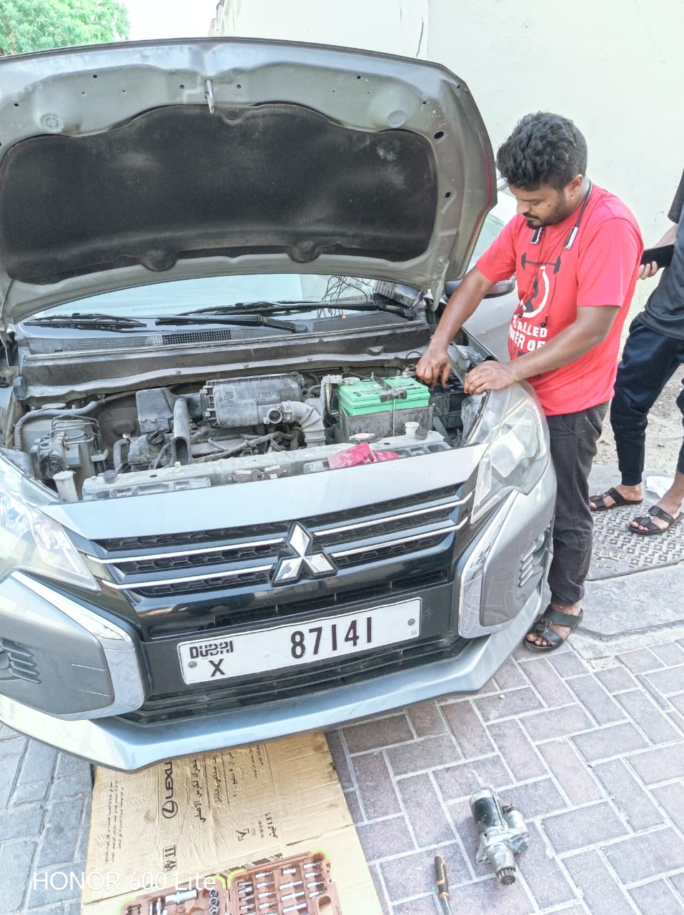 Wheel and tyre change at the roadside in Dubai